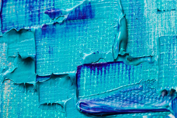 Close up photo of oil paints on canvas background.