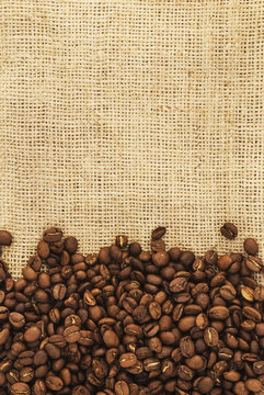 Coffee beans on burlap.