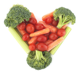 Broccoli, carrots, celery and tomatoes in a heart shape.