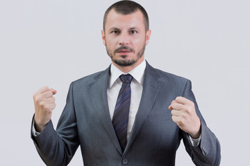Businessman holding his fists tight 