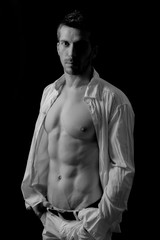 Muscular man with an opened shirt 