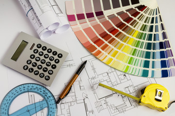 An office desk with the project papers