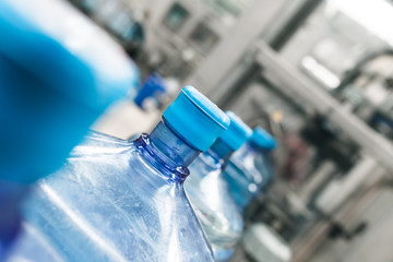 Water factory - Water bottling line for processing and bottling pure spring water into gallons.