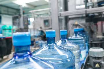 Water factory - Water bottling line for processing and bottling pure spring water into gallons.