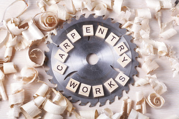 Construction tools on wooden table with sawdust. Joiner carpenter workplace top view. Copy space for text