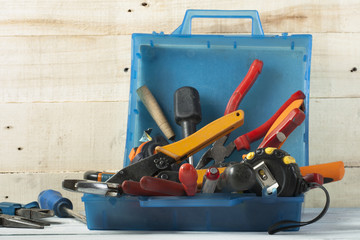 Construction tools on wooden background. Copy space for text. Set of assorted work tool. Top view