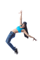 Young sexy woman dancer dancing on a white studio background