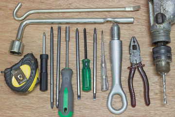 Tools lay on the wooden floor