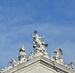Fototapeta na wymiar Assumption of the Virgin Mary into Heaven at the top of jesuit church in Venice, made by baroque sculptor Torretti in the 18th century