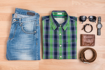 Classic men casual outfits with accessories on table