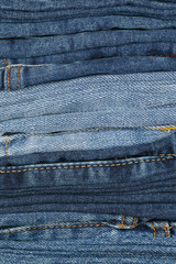 stack of folding  jeans for pattern and background