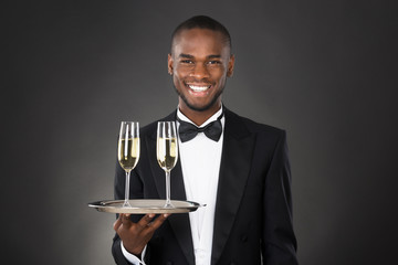 Waiter Holding Champagne Drink