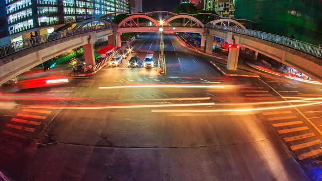 Yangon Cityscape Crossroad Traffic Time Lapse On Night Time Of Yangon City, Myanmar (zoom out)