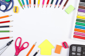 School accessories and shape of building on white background, back to school concept, copy space for text