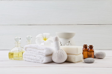 beautiful composition of spa treatment on wooden background