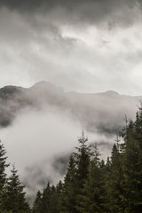Storm clouds, and adter rain mist in the Romanian mountains, in summer