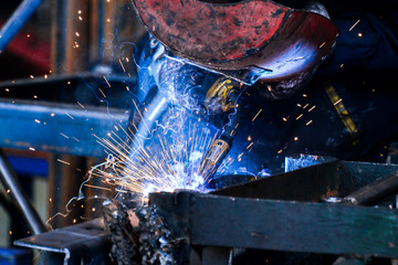 Arc welding of a steel in factory