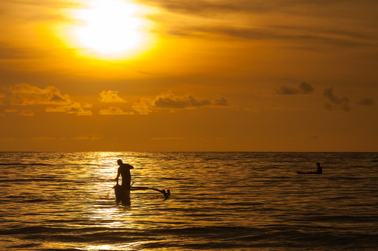 Fishing at sunset, Bali, Indonesia