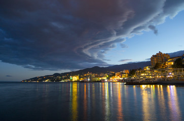 Evening Seaside City and Clouds © viktorbond