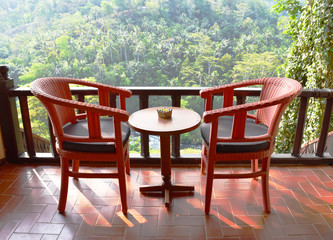 Two chair on the balcony, view of tropical tree