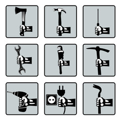 Set of hands holding tools. Vector hands with screwdriver, electric drill, wrench, hammer, pickaxe, socket, ax, mounting. Retro styled vector icons