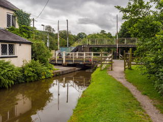 Fototapeta na wymiar Macclesfield, Cheshire, UK. July 25th 2016. Swing bridge over canal, Macclesfield, Cheshire, UK