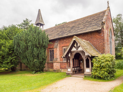 Styal, Cheshire, UK. July 26th 2016. Quintessential english village church in Styal village on a cloudy summer day, Styal, Cheshire, UK