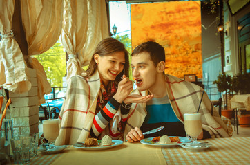 Obraz na płótnie Canvas couple in love having fun on a date