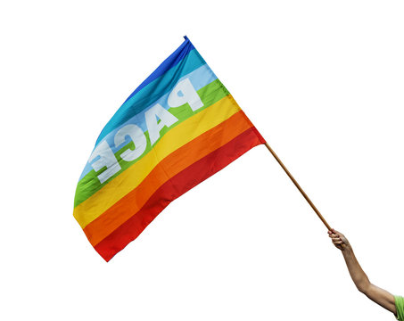 Hand holding a gay rainblow flag