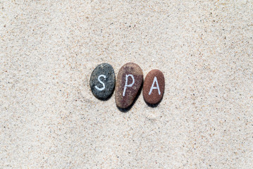 zen stones on the sand background