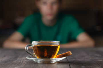 angry boy with tea
