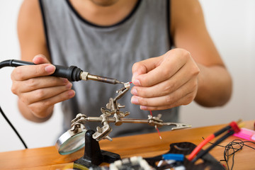 Welding parts of cable for flying drone
