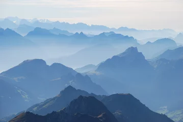 Foto op Plexiglas Blauwe bergketens silhouet © maurusasdf