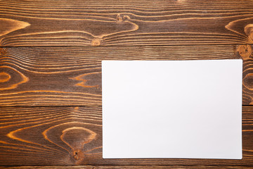 The white sheet on a wooden background