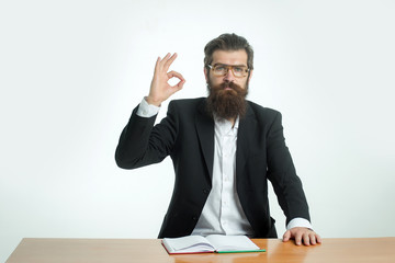 bearded man teacher at table