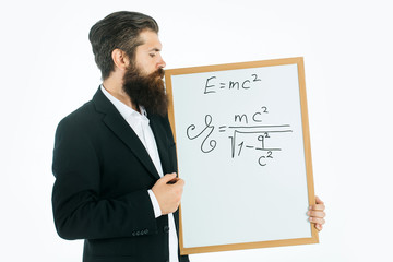 bearded man with einstein formula and newtons law