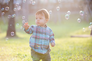 cute boy with bubble