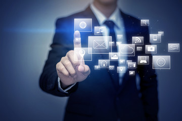 Close up of businessman touching social media icon