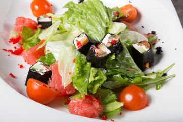 Grapefruit salad with iceberg lettuce and rolls