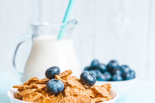 Healthy Breakfast, Cornflakes Blueberry And Milk, Nuts, Almond With Text Space Top View Close-up Instagram Filter