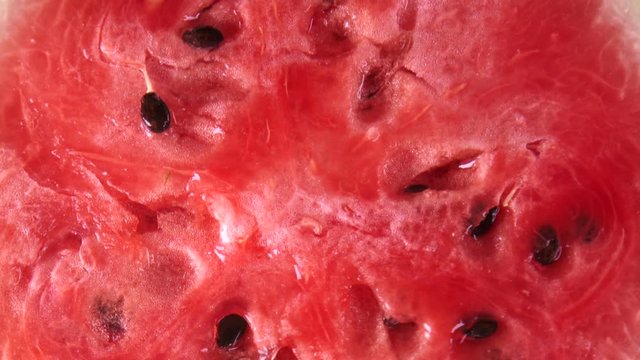 Watermelon with juicy red flesh close-up