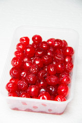  Sticky glace cherries, isolated on a white background