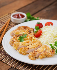 Fried pork cutlet with fresh cabbage salad and sauce