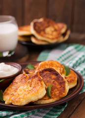Cheesecakes with mint and sour cream. Breakfast.