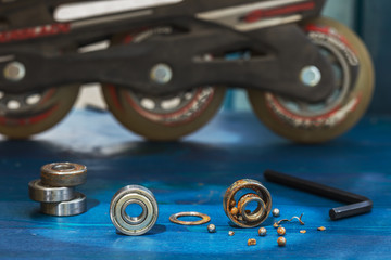 Replacing a broken wheel bearing on a scooter or roller