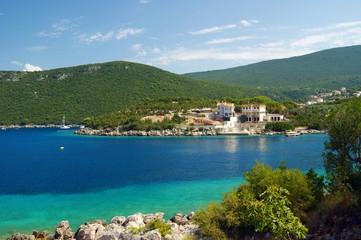 Fototapeta na wymiar Bright summer seascape with Lustica peninsula in Montenegro