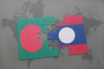 puzzle with the national flag of bangladesh and laos on a world map background.