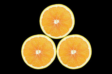 Three of cross section orange on black background
