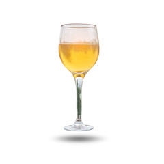 Closeup white wine in a glass isolated on white background.