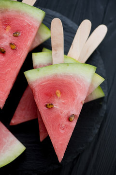 Sticks with watermelon slices, close-up, high angle view